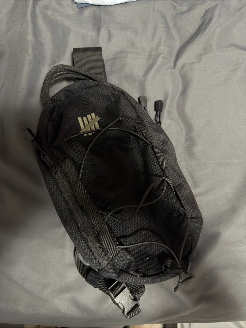 Undefeated mini crossbody bag